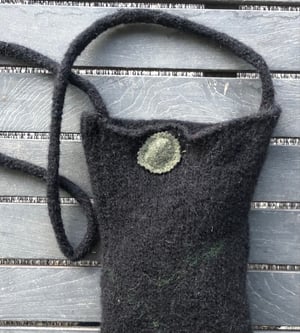 Image of Cross body black hand knit and felted bag. 
