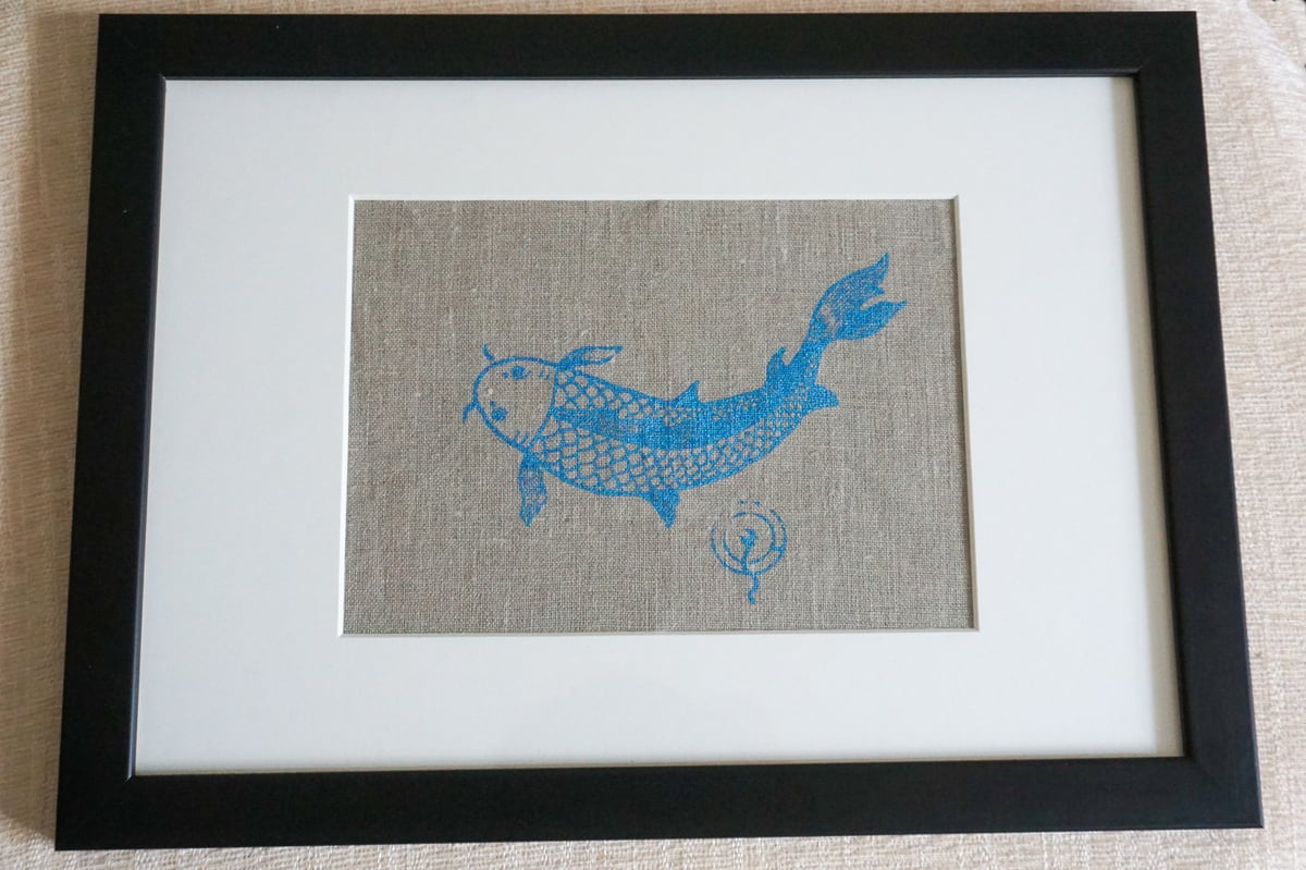 Image of Carp in sparkling blue topaz