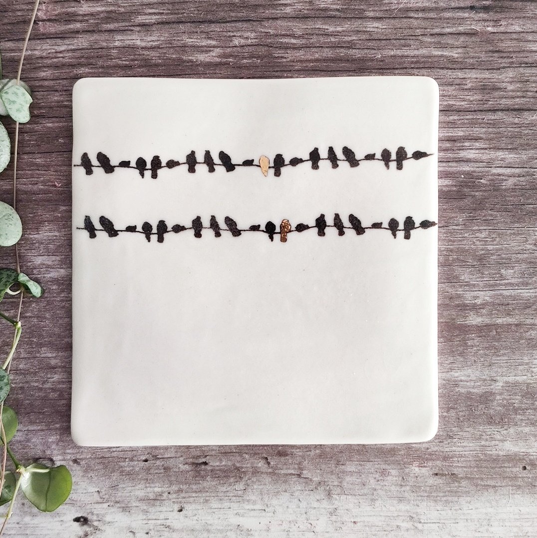 Birds on a wire porcelain wall tile