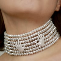 CLUTCHING MY PEARLS