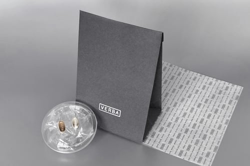 Image of "Man the player" silver earrings with rock crystal and smoky quartz · HOMO LUDENS ·