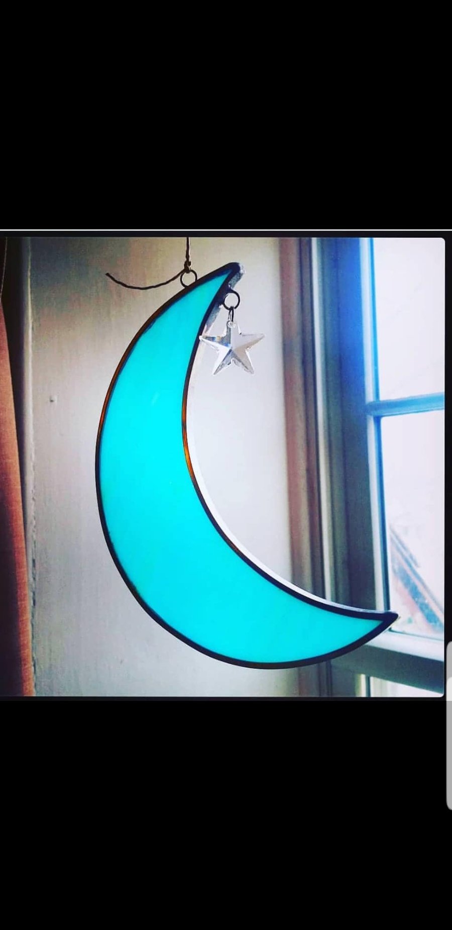 Image of Crescent moon w/hanging star