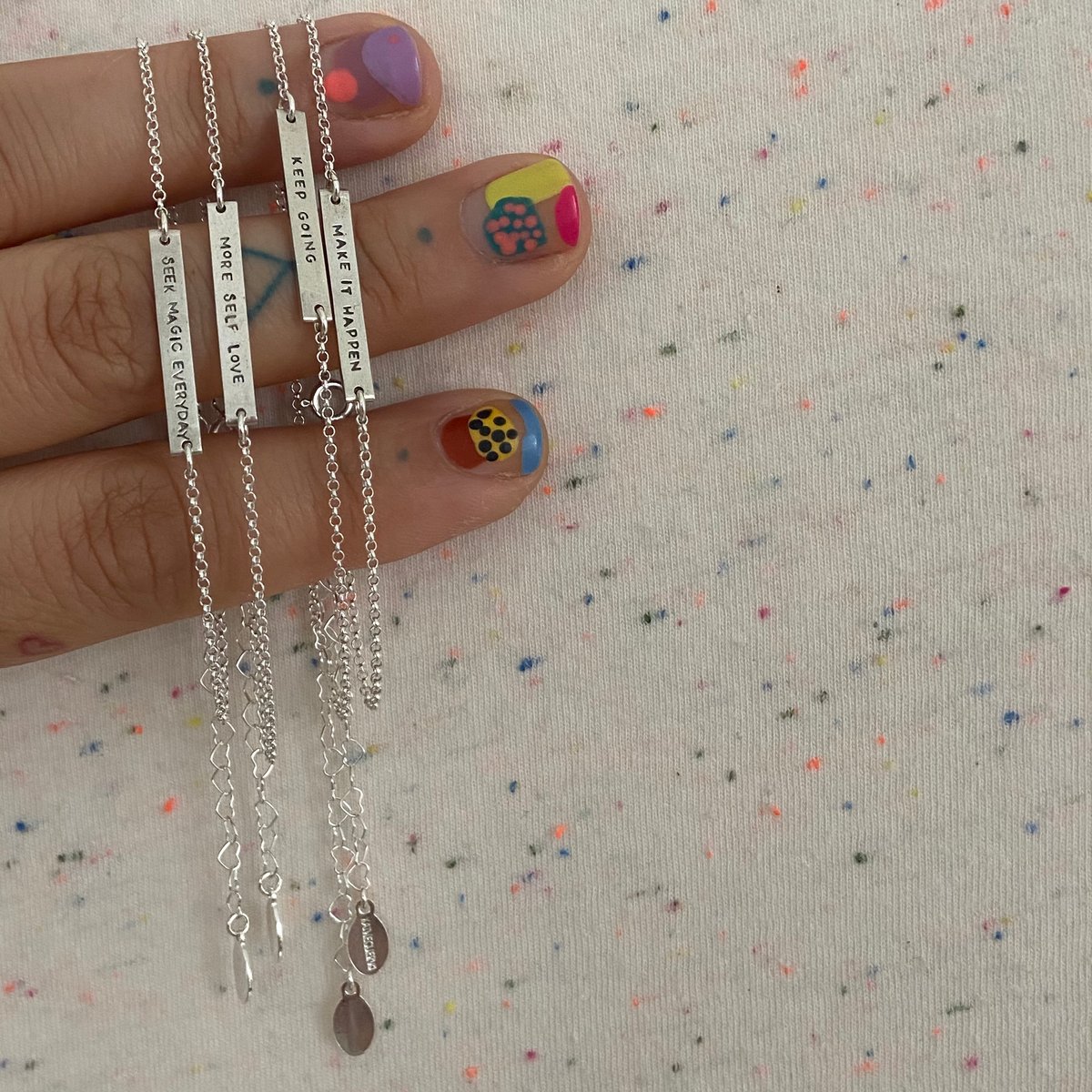 Image of bar bracelet with heart chain