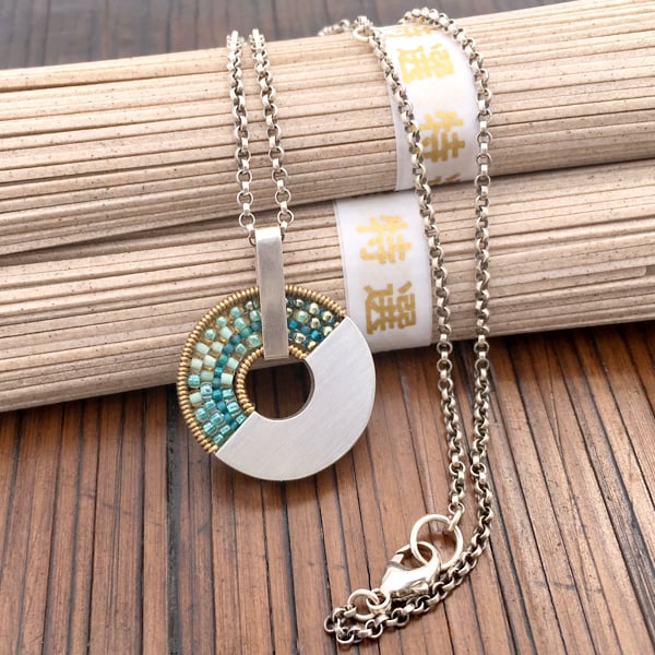Image of Spinner Pendant Necklace