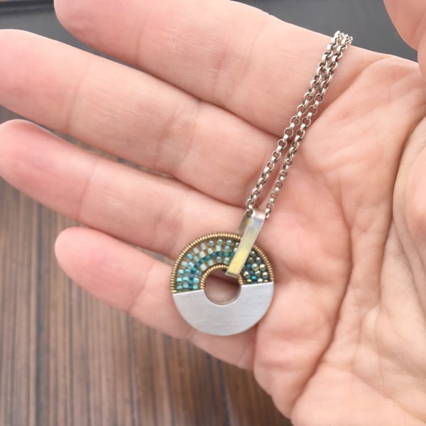 Image of Spinner Pendant Necklace