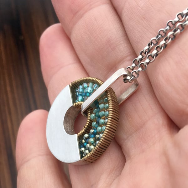 Image of Spinner Pendant Necklace