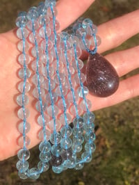 Image 3 of Blue Topaz Mala with Rare Super Seven Fireworks Pendant