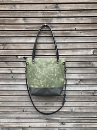 Image 4 of Waxed canvas leather tote bag in olive green with zipper closure and cross body strap