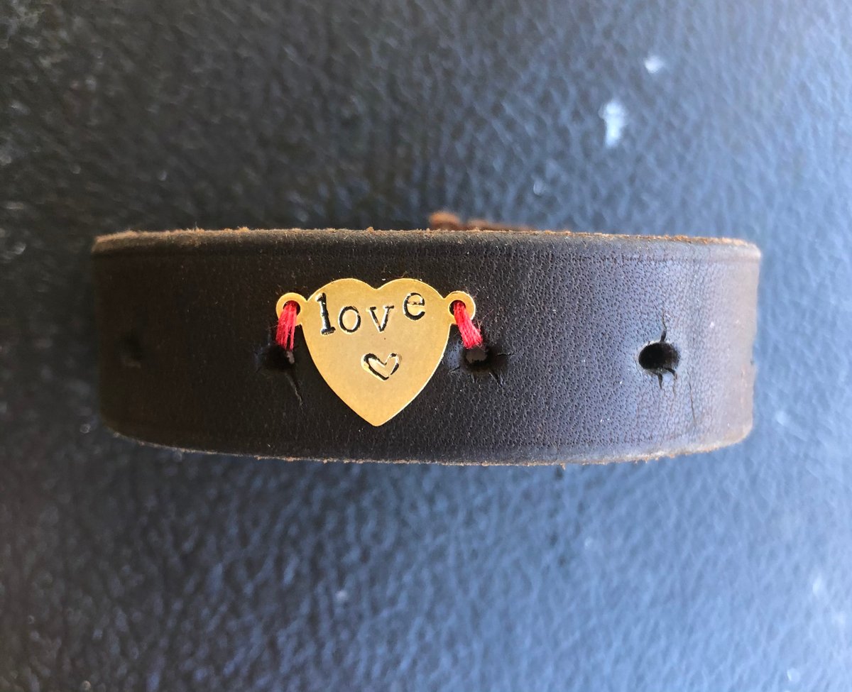 Image of Thin leather cuff with brass heart