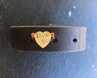 Image 1 of Thin leather cuff with brass heart