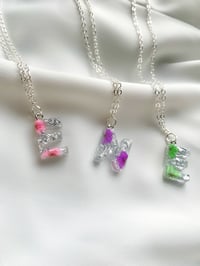 Image 1 of Silver floral initial necklaces