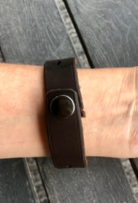 Image 4 of Thin leather cuff with brass heart