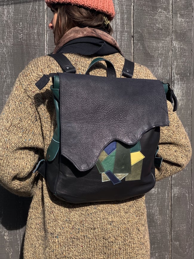 BsD Backpack Black Leather with leather remnant collage