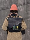 BsD Backpack Black Leather with leather remnant collage