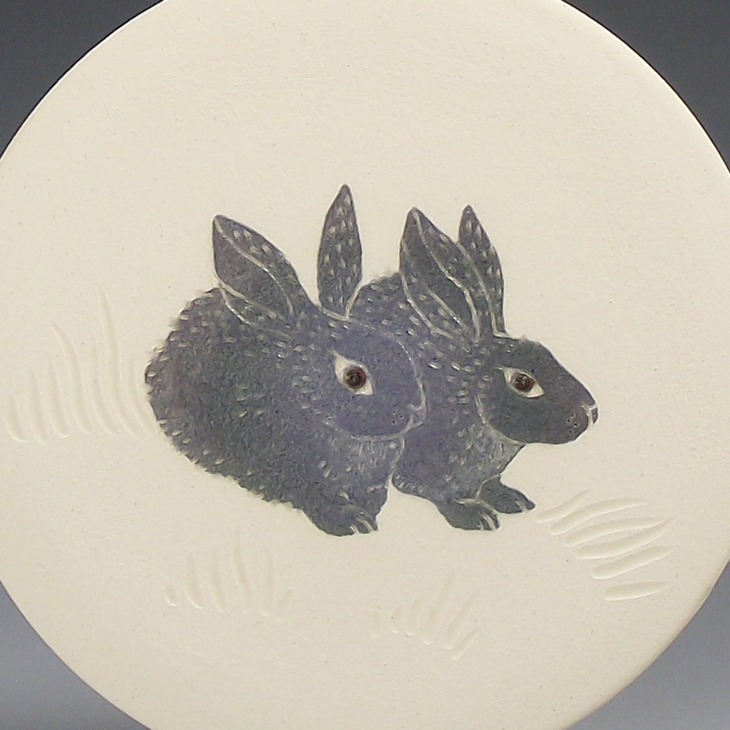 Image of Woodland bunnies ceramic wall hanging