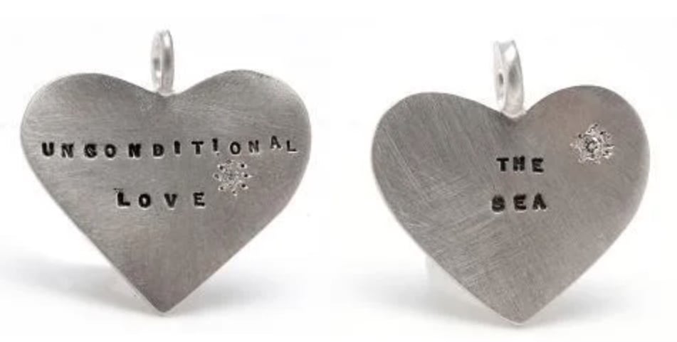 Image of Silver charms with a diamond (Well-Being, Unconditional Love, The Answer, The Sea, A Magic Wand)