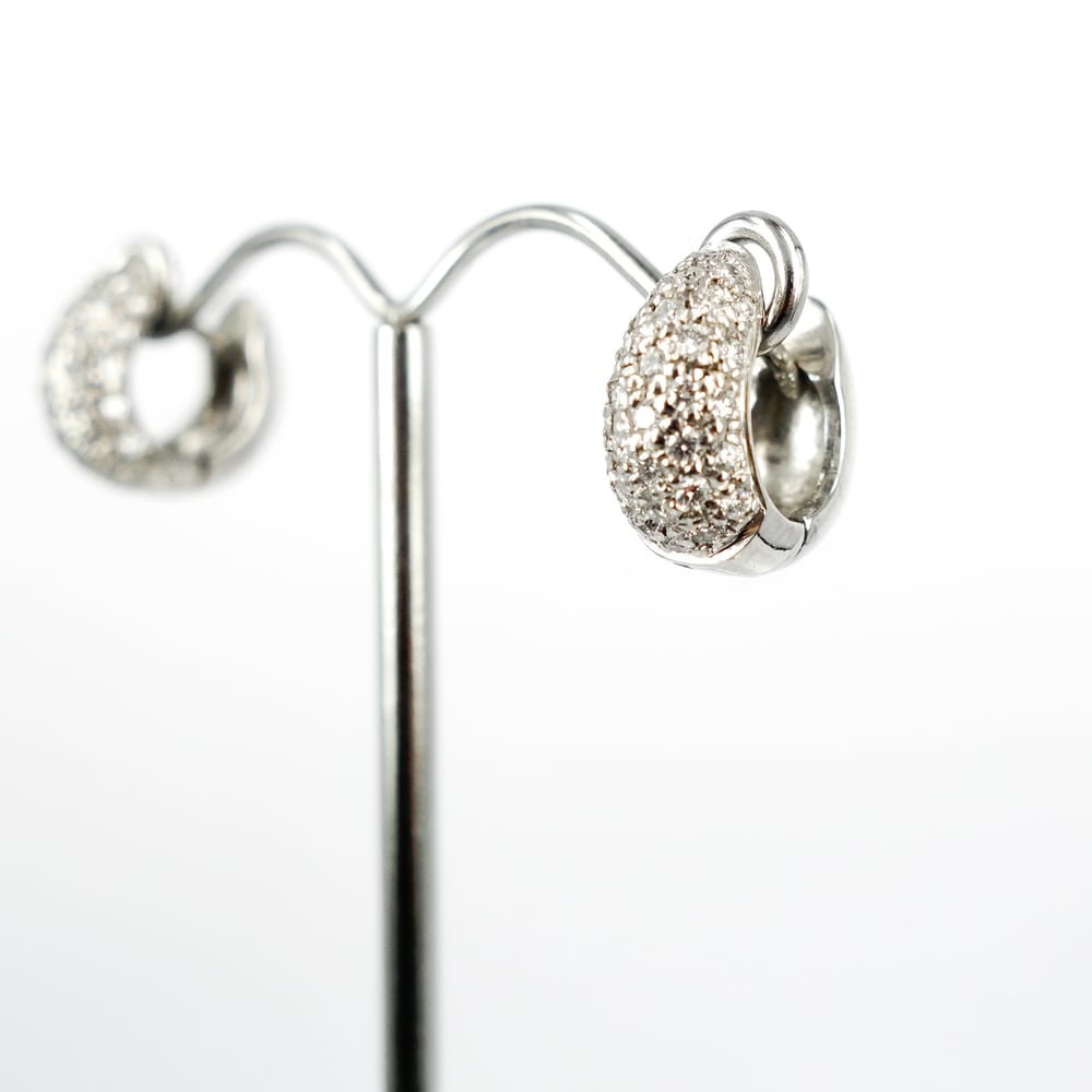 Image of Elegant 18ct white gold pave set huggie earrings. Pj4906
