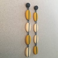 Image 2 of long yellow seed earrings