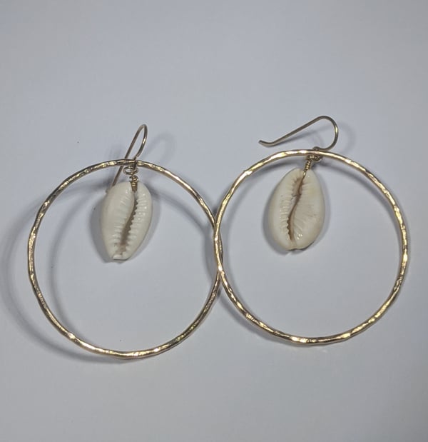 Image of Large gold cowrie hoops 