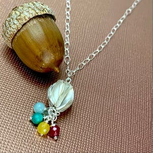 Sterling "seed" pendant with round beads