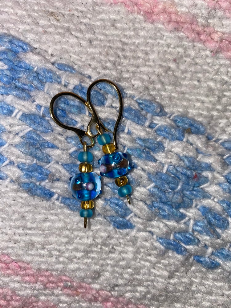 Image of Blue and gold dangle earrings 