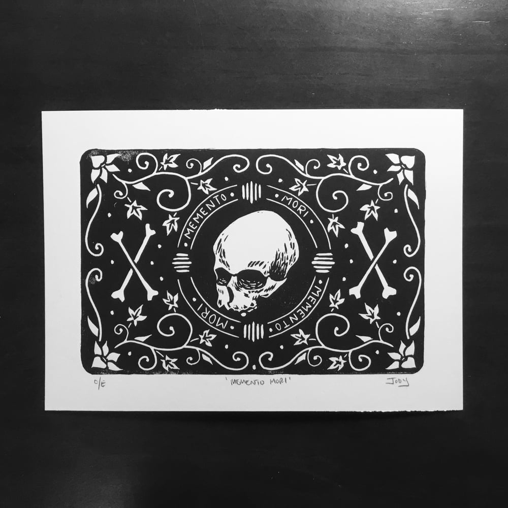 Memento mori skull and bones linocut print.