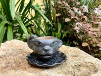 Image 1 of Black & grey jaguar cup & saucer 