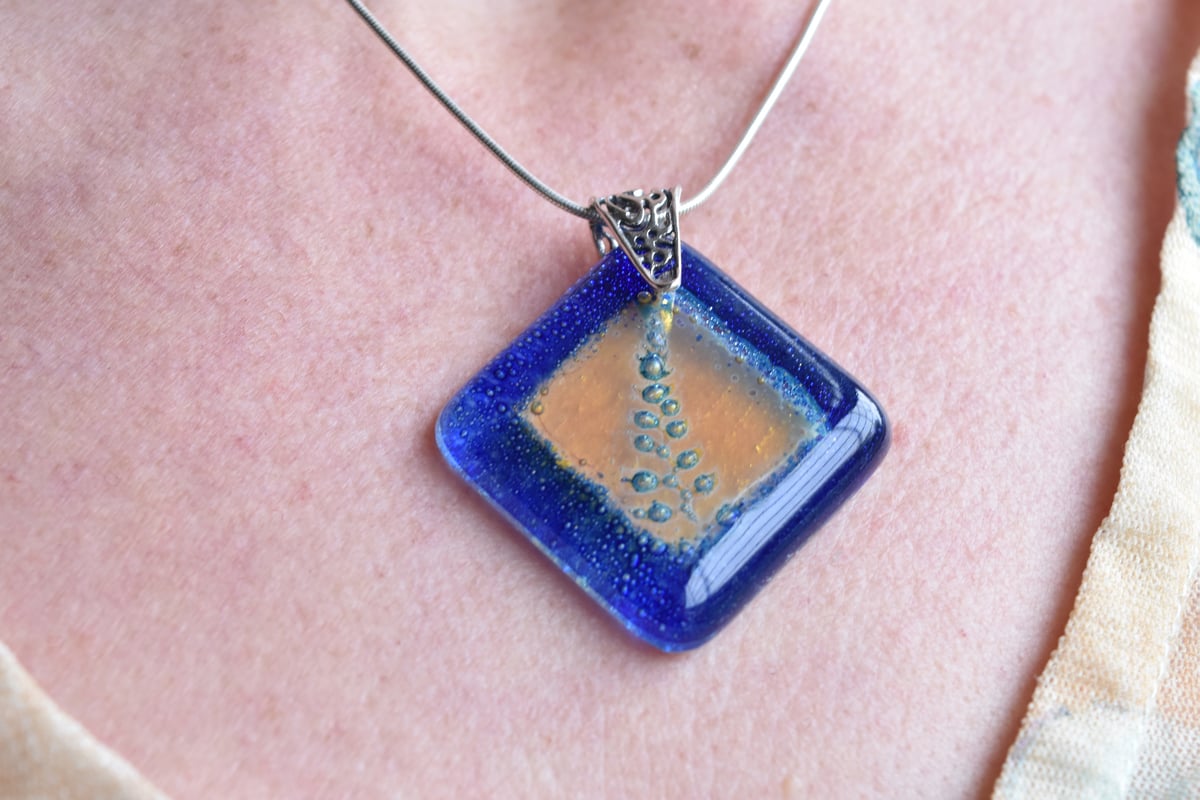 Image of Holly Fern Golden Window Cobalt Blue Pendant Necklace