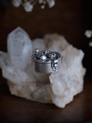 Image of TRINITY KEEPSAKE LOCKET