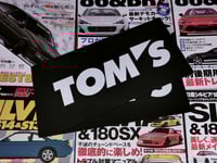 TOM'S License Plate