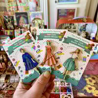 Image 1 of Needle Minders