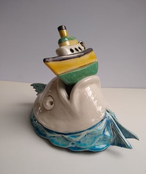 Huge fish catches a boat