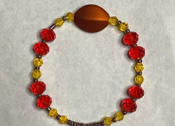 Bracelet with red and yellow | Youthful Skills by Averionna