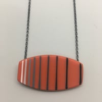 Image 1 of coral pink graphic pendant