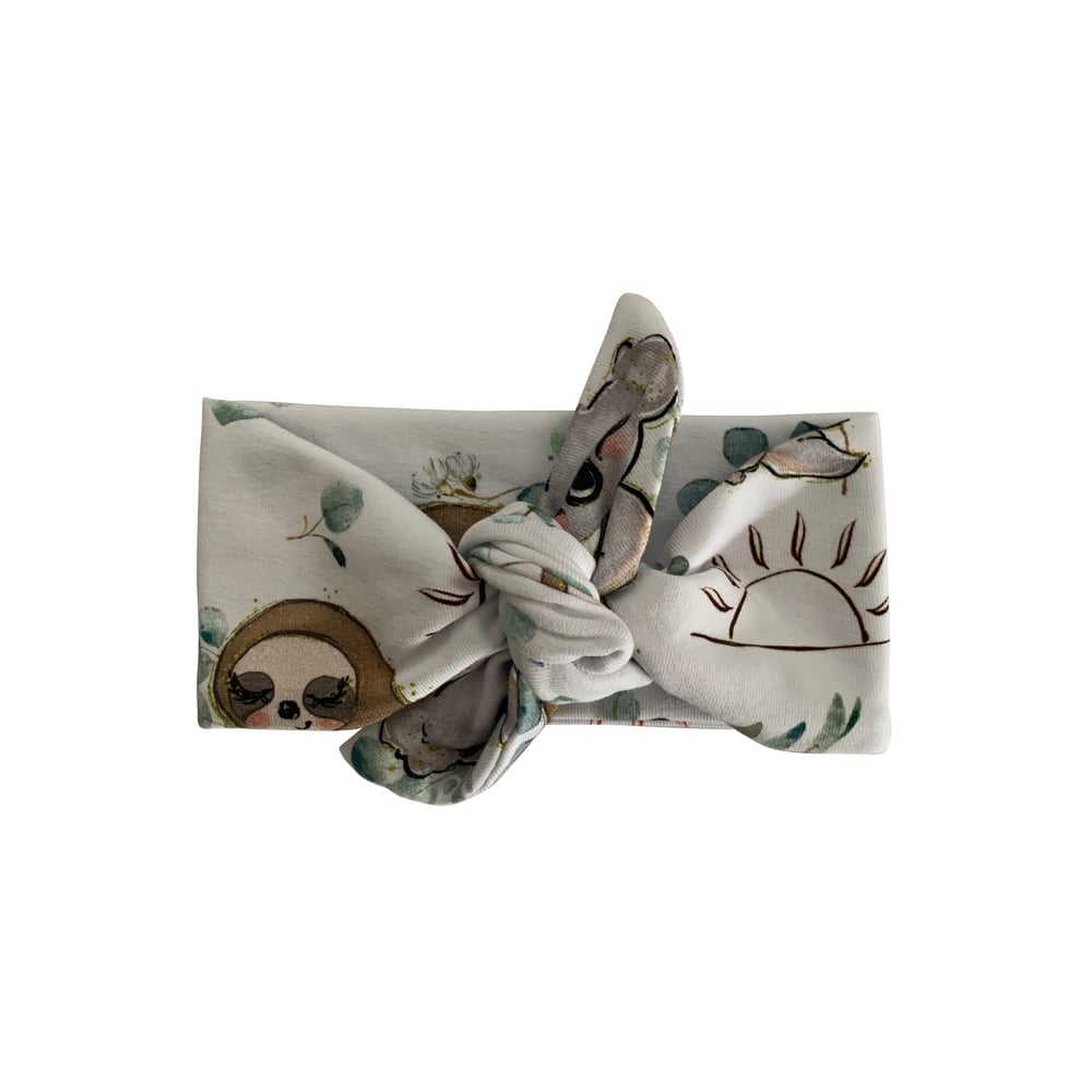 Image of koala & sloth top knot