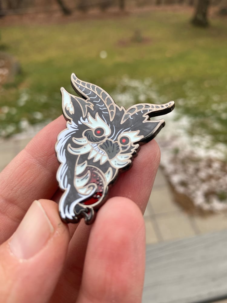 Image of Krampus 1.5" Hard Enamel pins. Black and Frost editions
