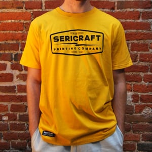 Image of SERICRAFT EMBLEM TEE - YELLOW