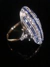 Edwardian 18ct yellow gold platinum calibre cut sapphire and diamond panel ring