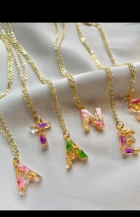 Image 1 of Gold floral initial necklaces