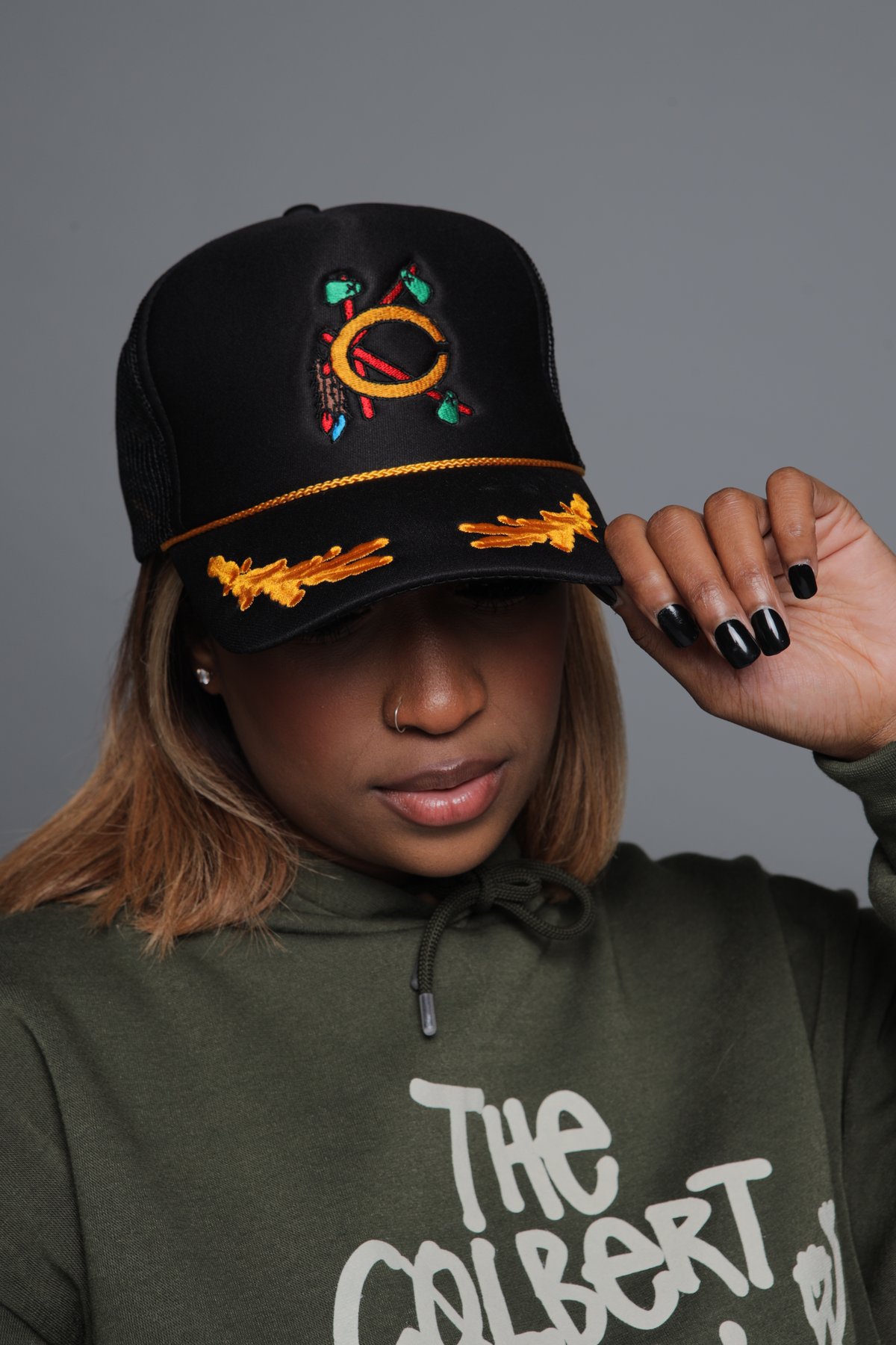 Image of Colbert klan Indian styled trucker hat. 