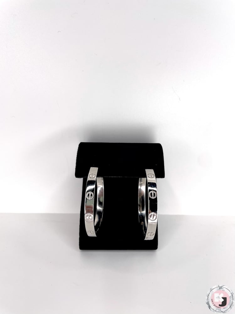 Image of designed hoop earrings 
