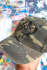 Image of center piece cap in camo