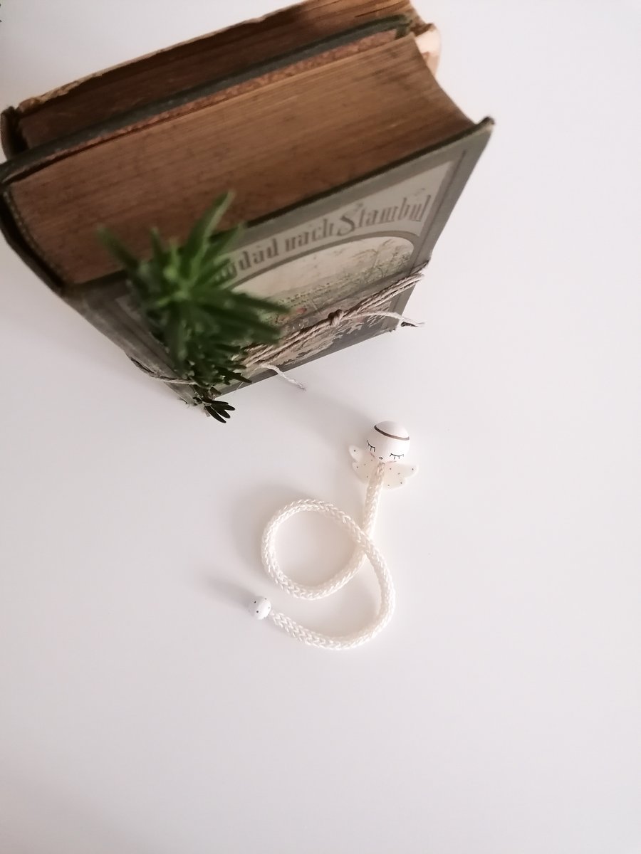 Image of White Angel bookmark with golden halo