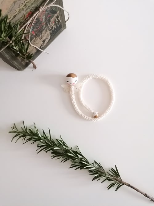 Image of White Angel bookmark with golden hair