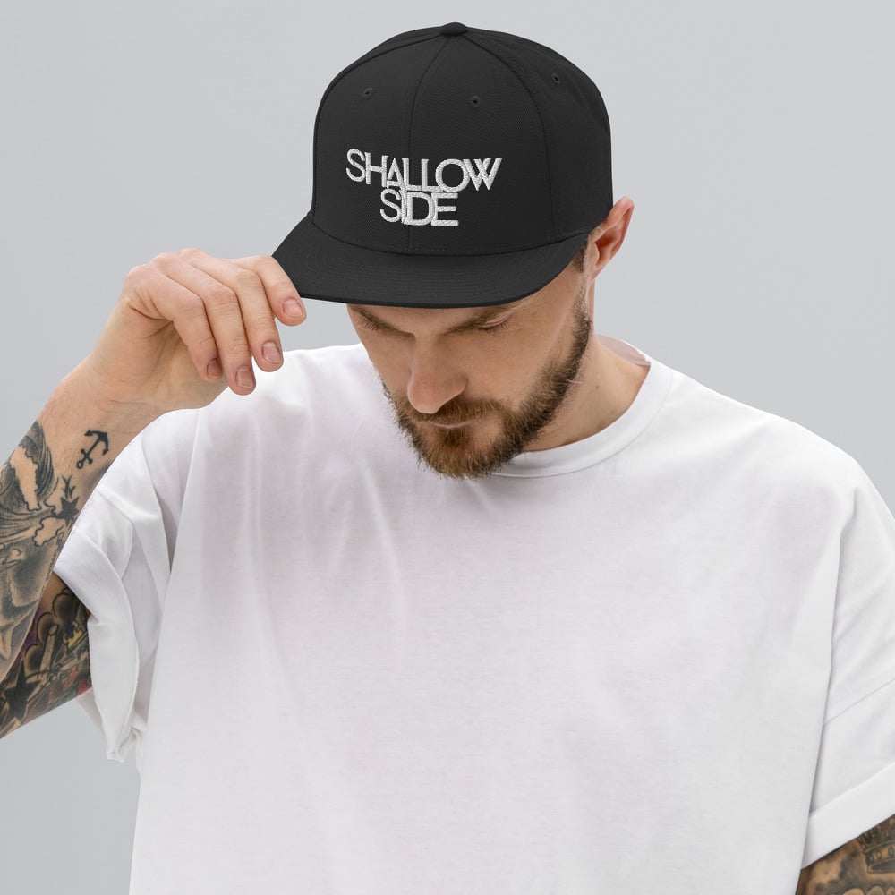 Shallow Side White Logo Snapback Hat