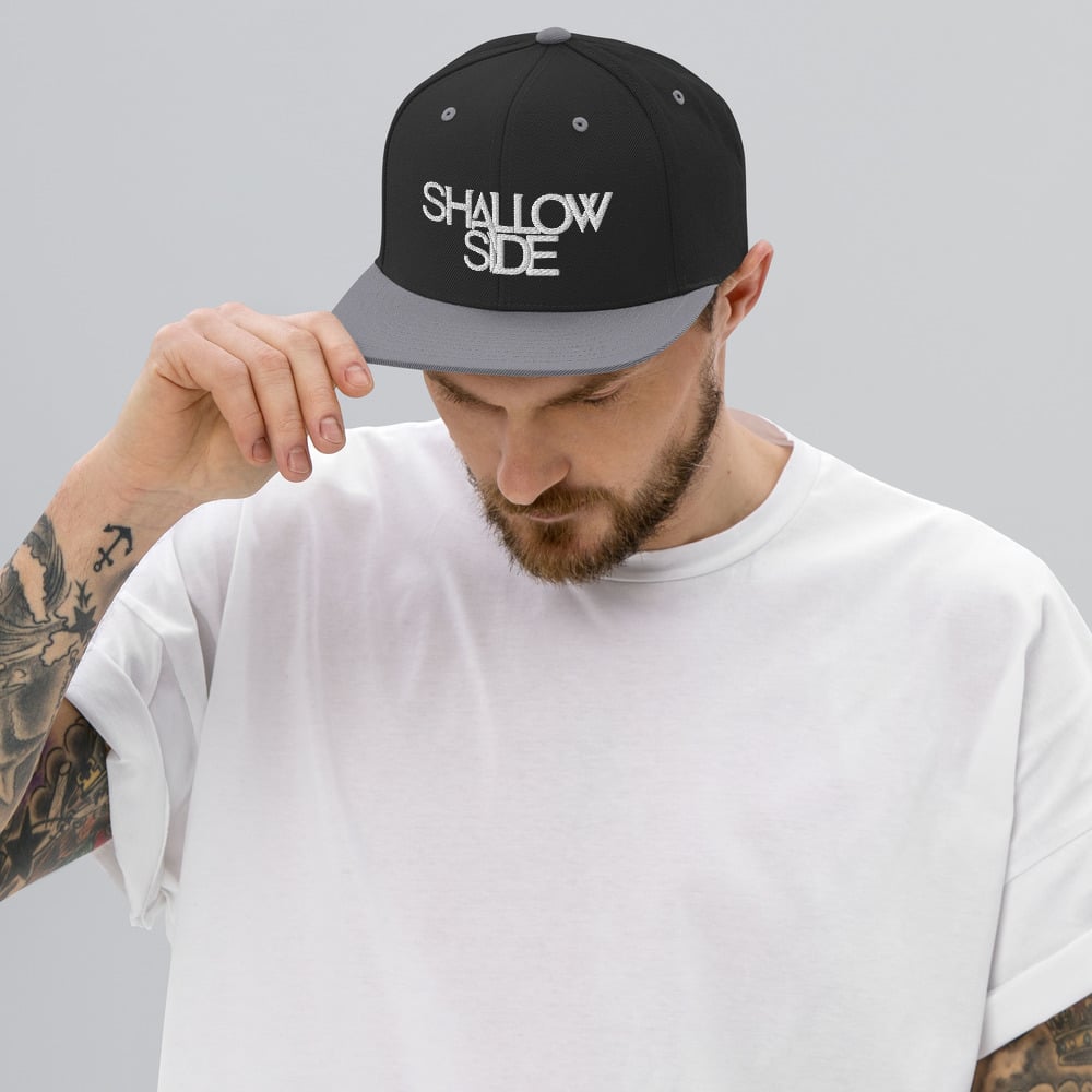 Shallow Side White Logo Snapback Hat