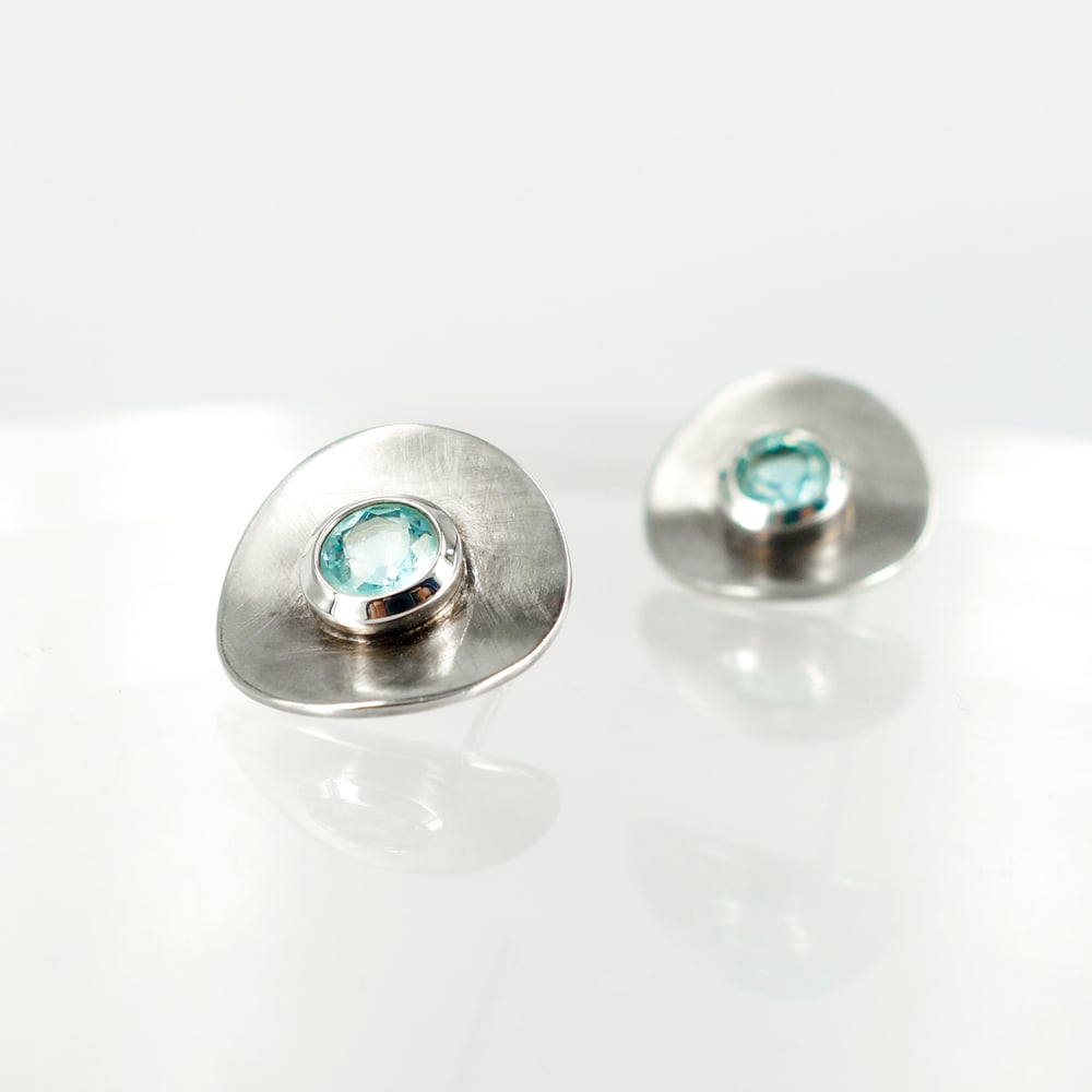 Image of Large sterling silver and blue topaz disc earrings. S/S1