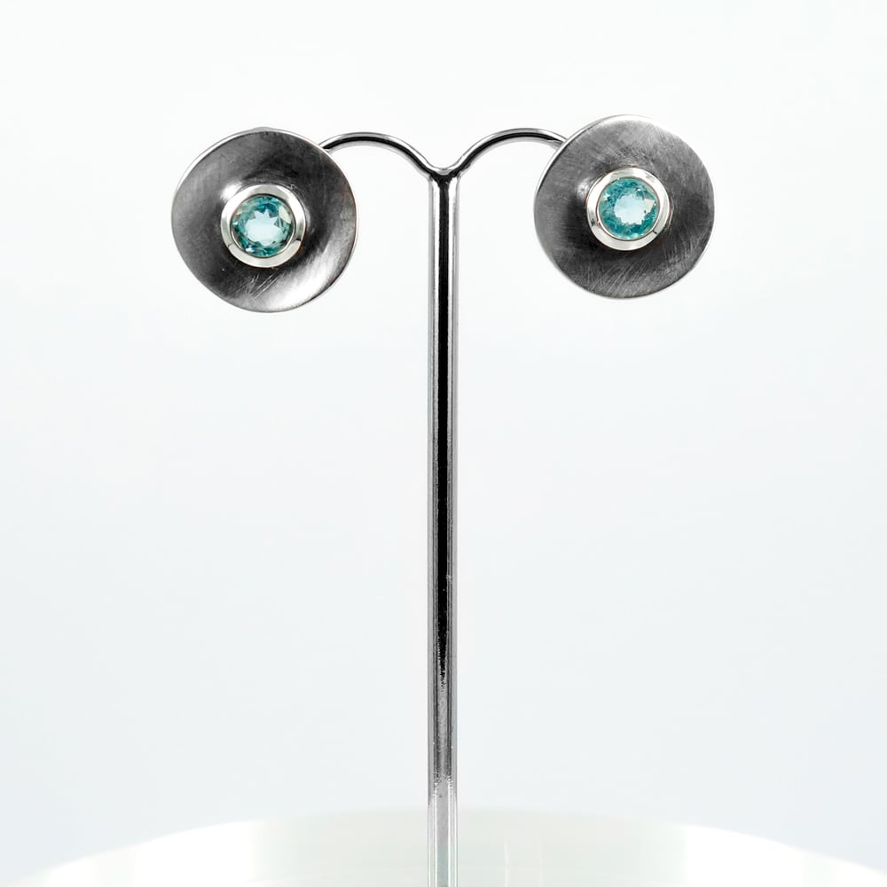 Image of Large sterling silver and blue topaz disc earrings. S/S1