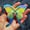 Image of holographic sticker: psEYEchedelic rainbow butterfly
