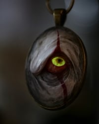 Image 3 of Pennywise Eye glow in the dark pendant OOAK